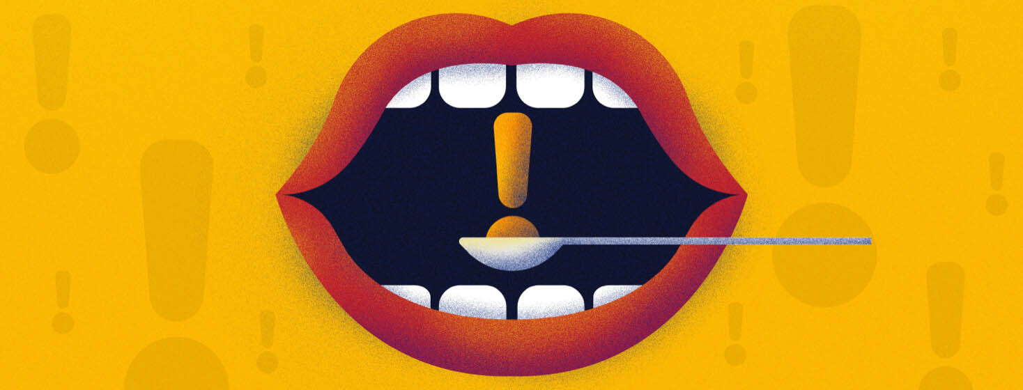 An open mouth receives a spoon with an exclamation point in it